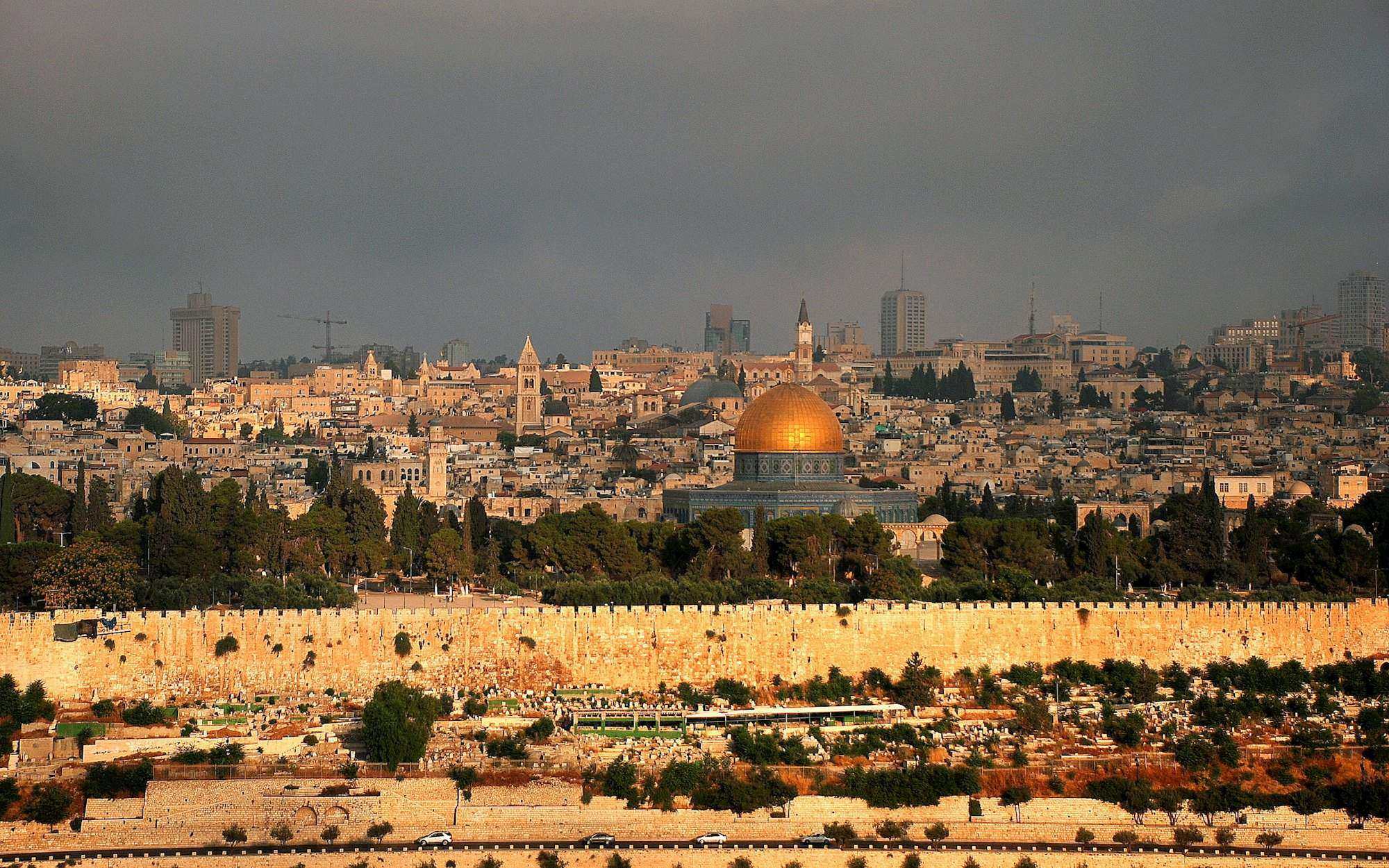 A city of pale stone at golden hour